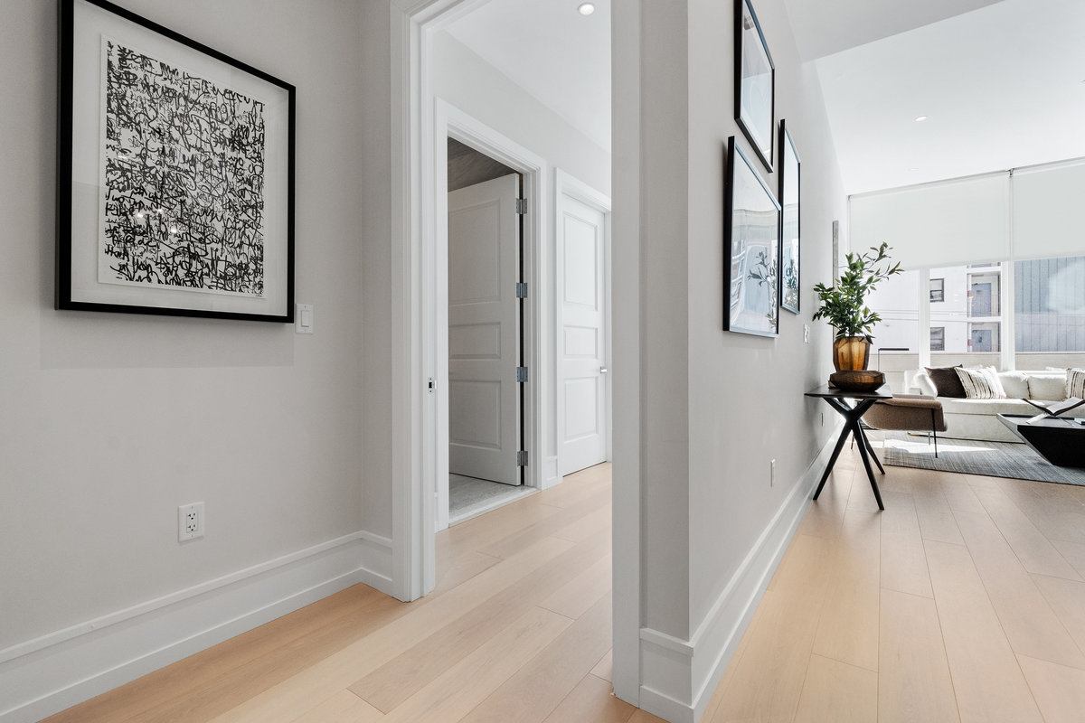 Entrance to bedroom suite; first doorway is to full bath; then door to walk-in closet